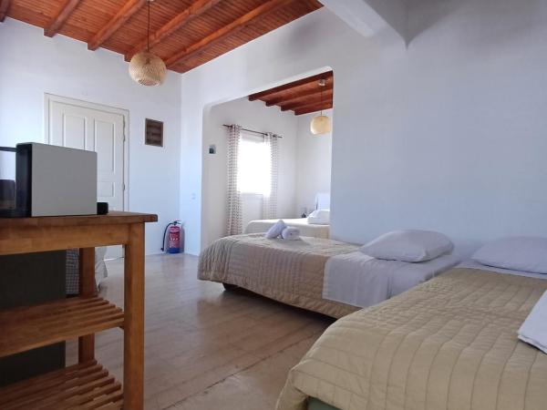 Manos Rooms : photo 3 de la chambre quadruple room