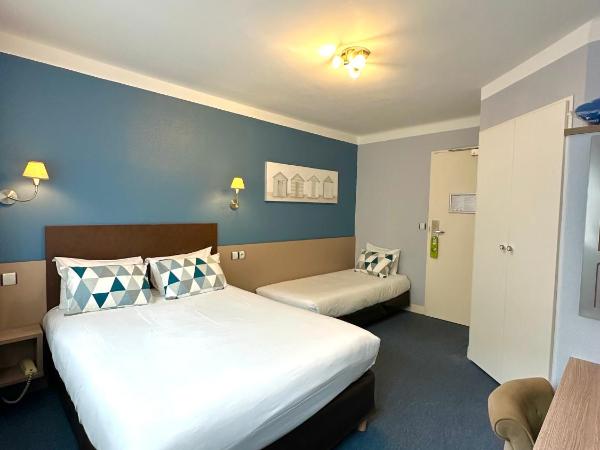 Hôtel de Caen : photo 1 de la chambre chambre triple