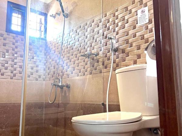 Fortkochi Beach Inn : photo 1 de la chambre chambre double ou lits jumeaux avec balcon