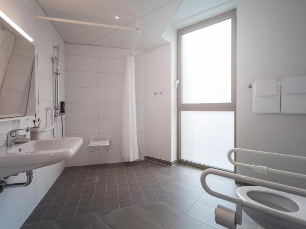 Holiday Inn - the niu Tab Dusseldorf Main Station, an IHG Hotel : photo 3 de la chambre chambre lit queen-size premium