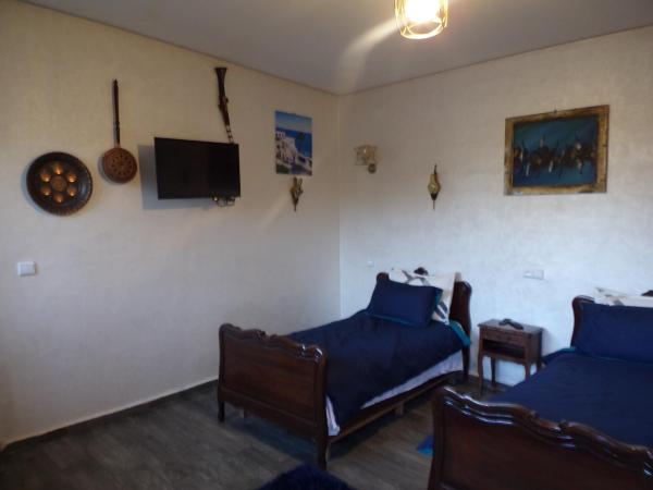 Jnane Ville Verte : photo 9 de la chambre chambre double ou lits jumeaux - vue sur jardin