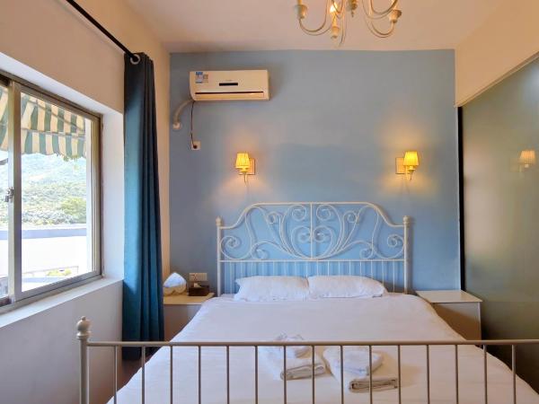 Cloud Tree Inn Yun Shu Li ,Xichong, Shenzhen : photo 3 de la chambre chambre double - vue sur jardin