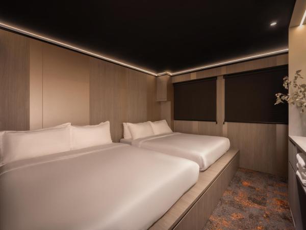CUBE Social at Boat Quay : photo 1 de la chambre family room with 2 queen bed