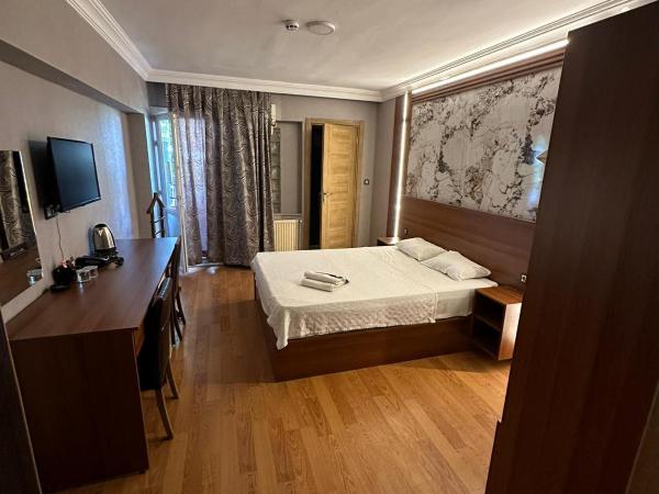 Emsa Otel Maltepedeki Eviniz : photo 3 de la chambre chambre quadruple standard avec balcon