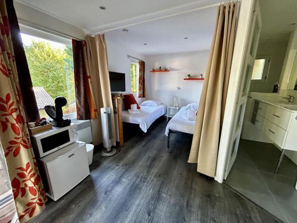 Les Chalets du Périgord : photo 4 de la chambre chambre quadruple premium