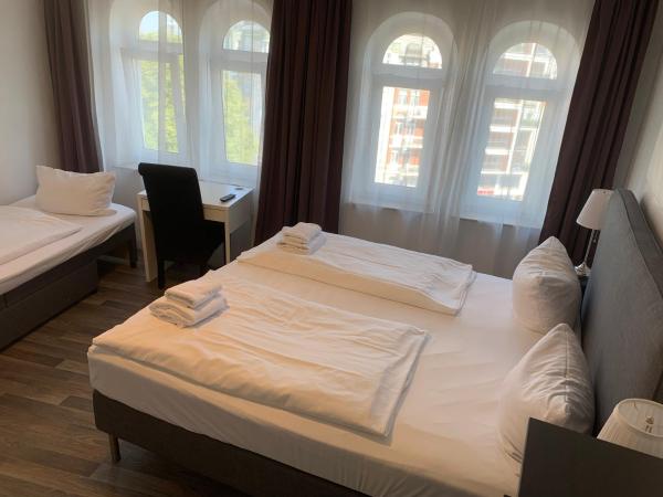 Hotel Bee Fang : photo 1 de la chambre chambre triple