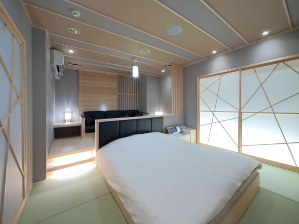 Design Hotel W Zip Club : photo 6 de la chambre chambre lit queen-size de luxe