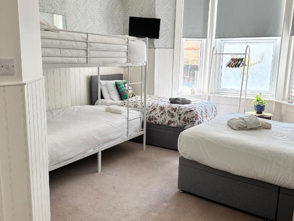 La Di Da Hotel beach town : photo 1 de la chambre chambre triple