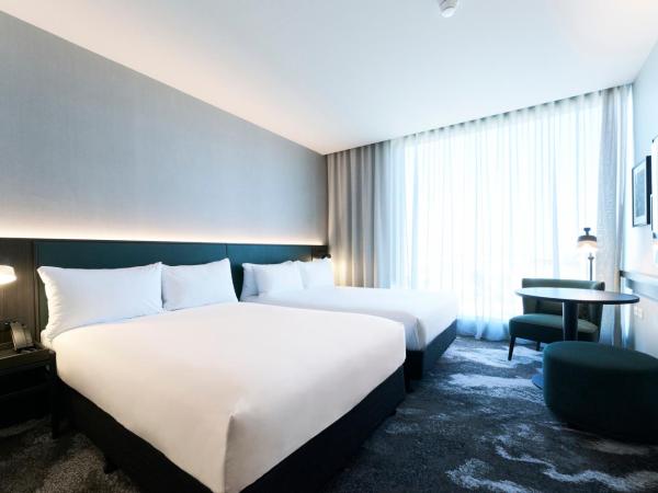 Novotel Melbourne Airport : photo 1 de la chambre chambre deluxe avec 2 lits doubles