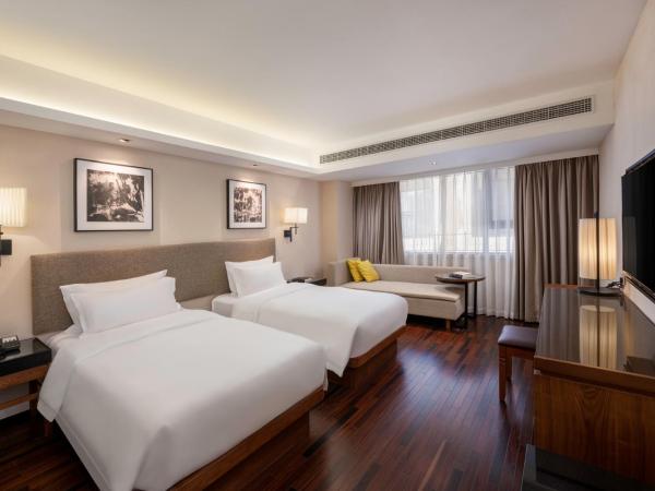 Sanya Great East Sea Junting Hotel : photo 1 de la chambre chambre lits jumeaux