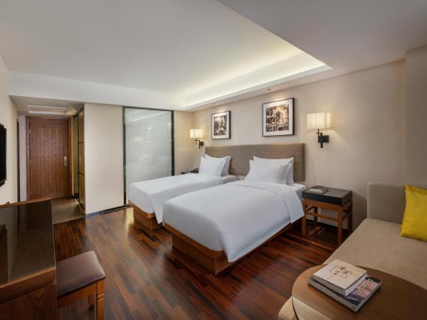 Sanya Great East Sea Junting Hotel : photo 3 de la chambre chambre lits jumeaux