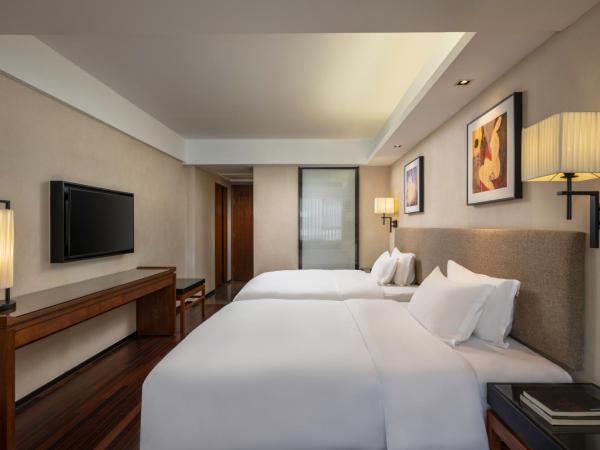 Sanya Great East Sea Junting Hotel : photo 3 de la chambre chambre familiale