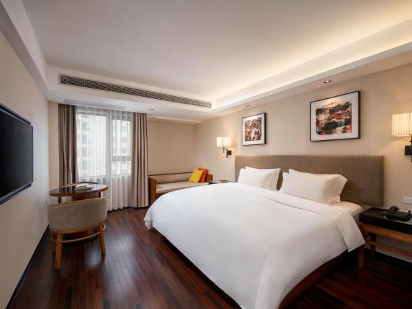 Sanya Great East Sea Junting Hotel : photo 1 de la chambre chambre standard lit queen-size