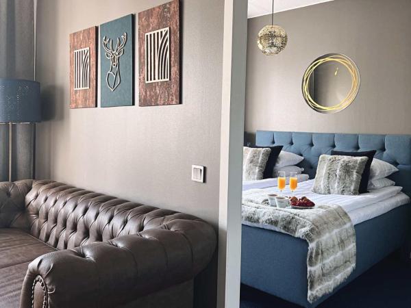 Hotel Golden Circle Suites : photo 3 de la chambre suite de luxe avec sauna