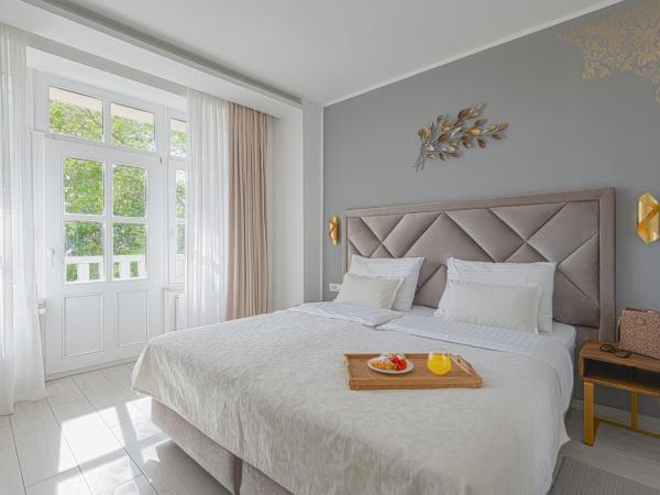 Heritage Hotel Stypia : photo 1 de la chambre chambre double deluxe avec balcon - vue sur mer