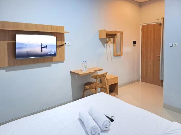 Daffa Inn Syariah near Jogja City Mall mitra RedDoorz : photo 9 de la chambre chambre double standard