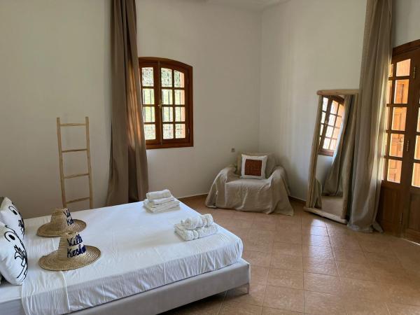 Villa Keshmere : photo 1 de la chambre chambre triple - vue sur la piscine