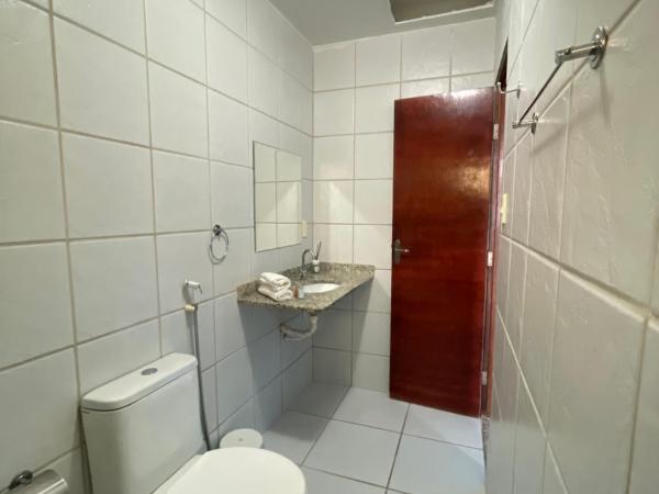 Pousada Jardim Magico : photo 5 de la chambre chambre quadruple avec salle de bains privative