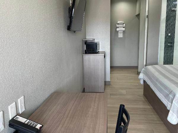 Express Inn - Richey : photo 1 de la chambre suite supérieure lit king-size