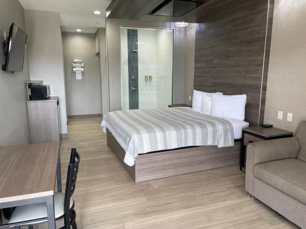 Express Inn - Richey : photo 2 de la chambre suite supérieure lit king-size