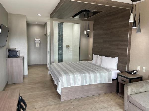 Express Inn - Richey : photo 1 de la chambre suite supérieure lit king-size