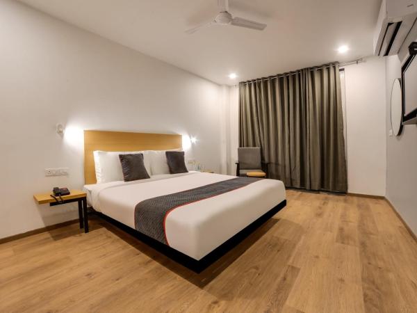 Super Townhouse 158 Near Netaji Subhash Marg Near Appu Ghar : photo 6 de la chambre chambre triple classique