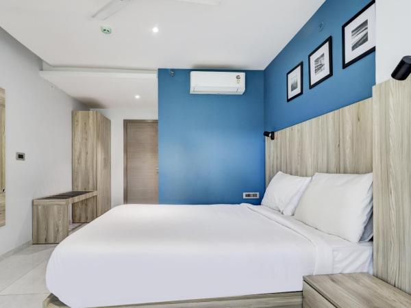 Sleek Townhouse Galexia Hotel and Resorts : photo 2 de la chambre chambre triple classique