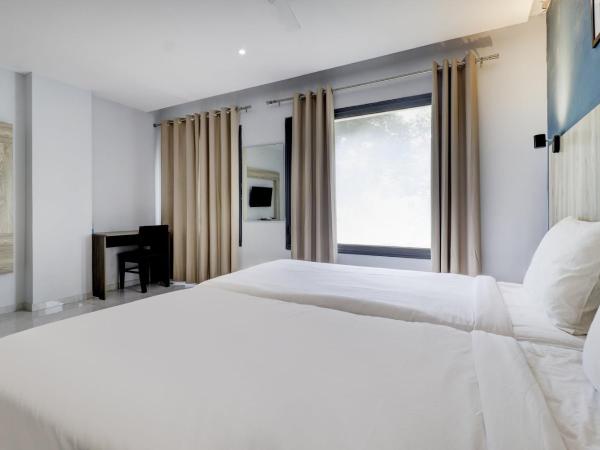 Sleek Townhouse Galexia Hotel and Resorts : photo 8 de la chambre chambre triple classique