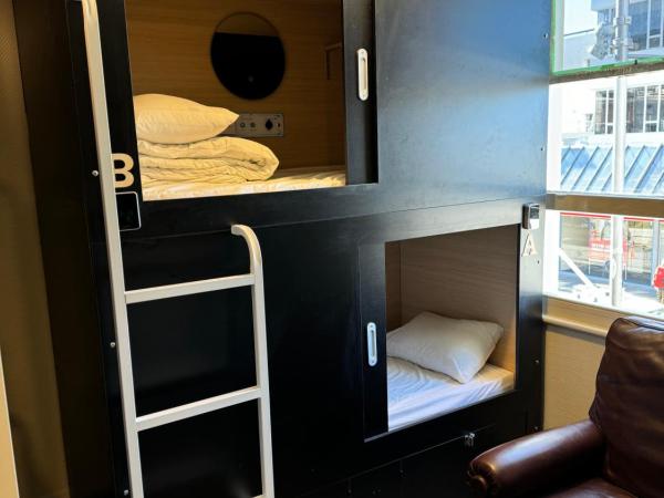 UpTown Backpackers : photo 3 de la chambre lit superposé dans dortoir mixte