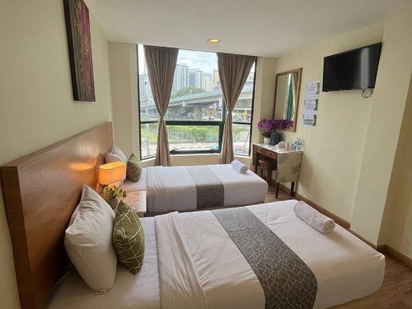 SCC Hotel City Centre : photo 1 de la chambre chambre lits jumeaux supérieure