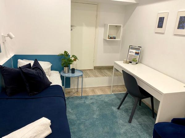 Stay in City : photo 4 de la chambre chambre simple standard avec salle de bains commune