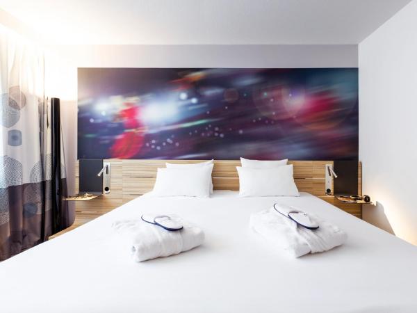 Novotel Limoges Le Lac : photo 1 de la chambre chambre lit king-size ou lits jumeaux