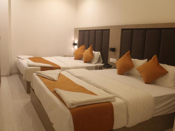 Hotel Metro Inn : photo 6 de la chambre chambre deluxe double ou lits jumeaux