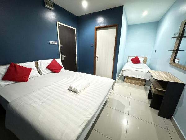 Hotel Pinji Ipoh : photo 1 de la chambre chambre triple supérieure