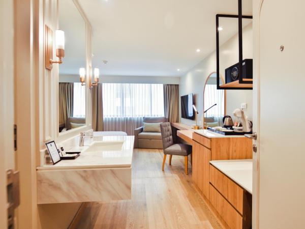 THEE Bangkok by TH District : photo 9 de la chambre chambre deluxe double ou lits jumeaux