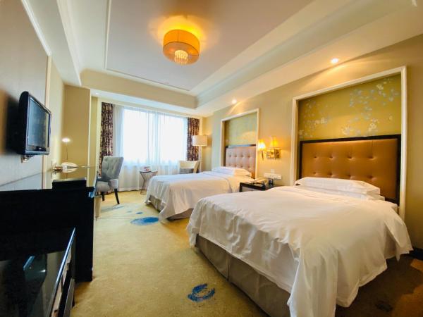 Ramada Plaza Tianlu Hotel : photo 1 de la chambre chambre lits jumeaux deluxe