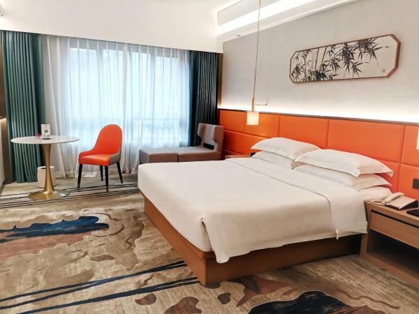 Landmark International Hotel : photo 3 de la chambre chambre lit king-size deluxe