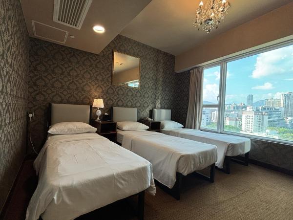 Ramada Hong Kong Grand : photo 1 de la chambre chambre triple