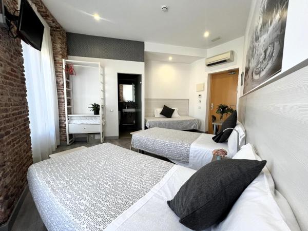 Hostal San Lorenzo : photo 6 de la chambre chambre triple