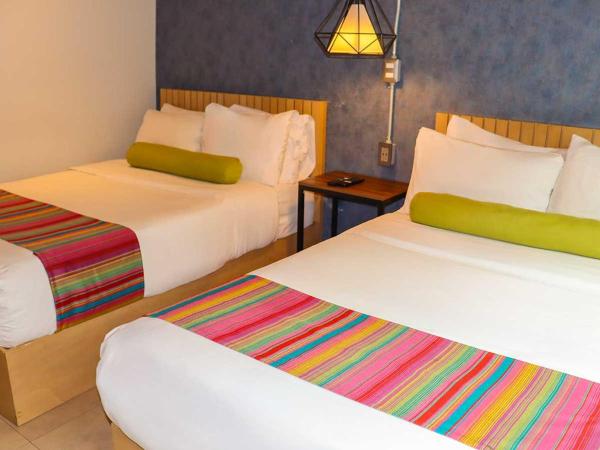 Estancias VIVE MX wtc : photo 3 de la chambre chambre double supérieure avec deux lits doubles