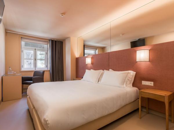 Hotel Margarida Da Praça : photo 1 de la chambre chambre double ou lits jumeaux deluxe - vue sur ville