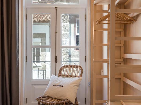 Hotel Margarida Da Praça : photo 2 de la chambre chambre simple - vue sur ville