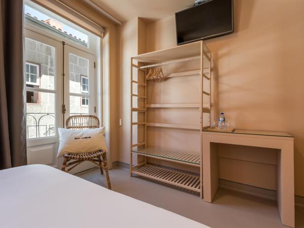 Hotel Margarida Da Praça : photo 3 de la chambre chambre simple - vue sur ville