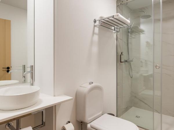 Hotel Margarida Da Praça : photo 4 de la chambre chambre simple - vue sur ville