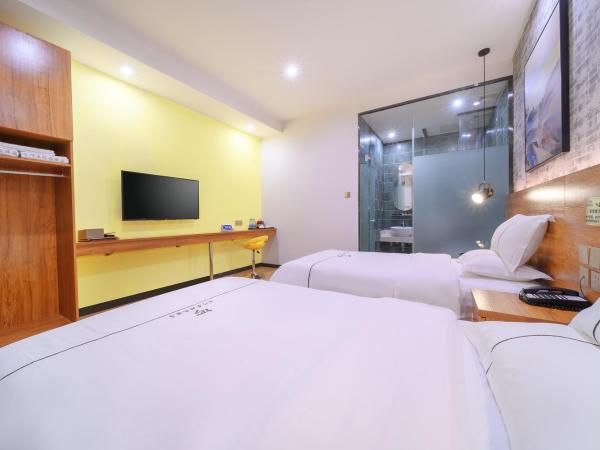 QiQiaoWu Fashion Hotel - Beijing Songjiazhuang Subway Station : photo 8 de la chambre chambre lits jumeaux deluxe