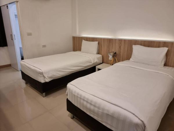 The Nimman Hotel - SHA Plus : photo 5 de la chambre petite chambre lits jumeaux