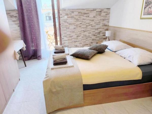 Rooms and Apartments Porto del Mar B & B : photo 10 de la chambre appartement 2 chambres avec terrasse et vue sur la mer