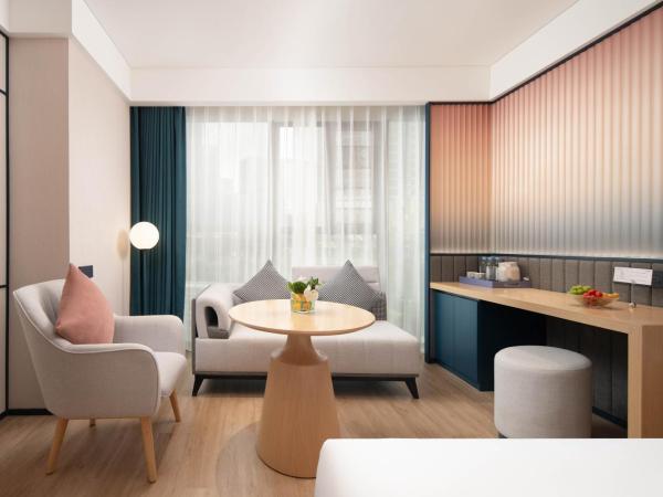 广州番禺万博中心舒与酒店 : photo 6 de la chambre chambre lit queen-size deluxe