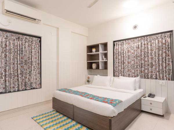 Bauhinia : photo 3 de la chambre chambre deluxe double ou lits jumeaux