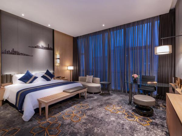 Chongqing Liyuan Hotel : photo 8 de la chambre chambre lit king-size exécutive